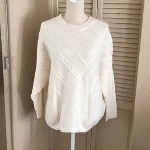 While asymmetric sweater